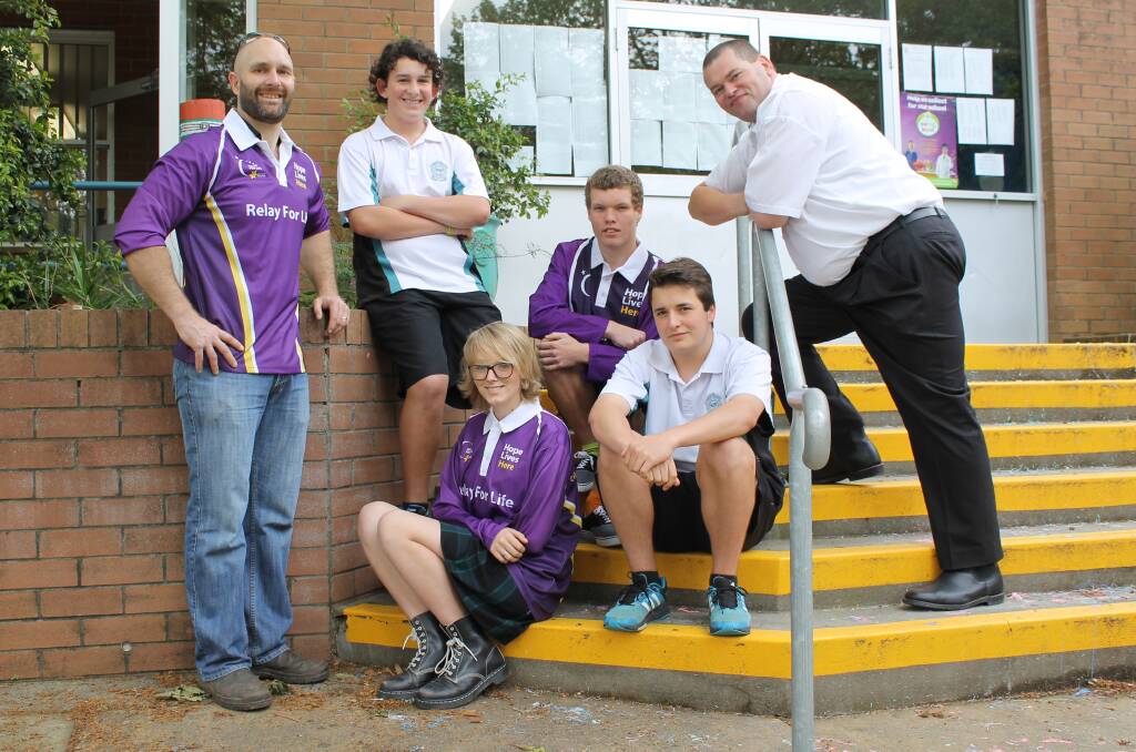 GOOD CAUSE: Some of Cardiff High School's Relay For Life team - principal Gareth Erskine, students Sam Jones, Cayla Blanch, Tim Hill, Cal Slinn and team leader David Sowden.