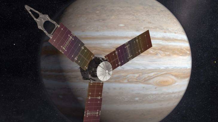 An artist's impression of Juno sweeping in front of Jupiter. Photo: NASA/JPL-Caltech