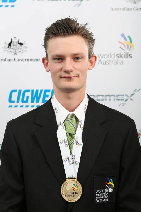Blair Watters of Speers Point wins gold medal for Vehicle Painting at the 2014 WorldSkills Nationals in Perth. Photo by WorldSkills Australia