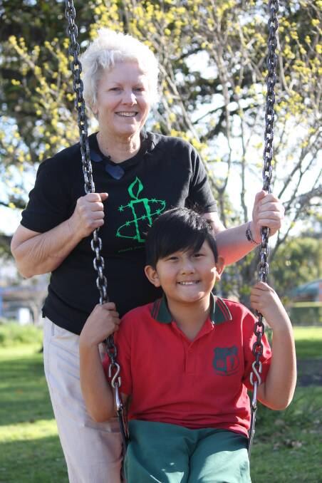 Lake Macquarie Amnesty International convener Stephanie Rodger and her grandson Zhong Snelson, 9, at Lambton Park.
