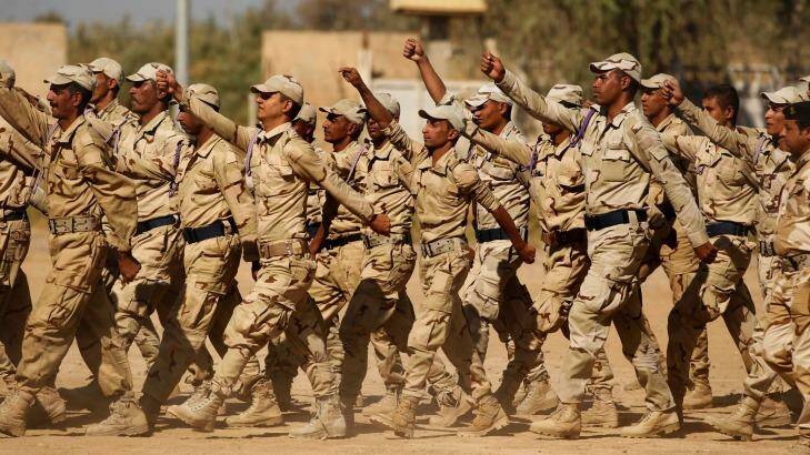 Iraqi army recruits march during training at Camp Taji in Iraq. Photo: Kate Geraghty