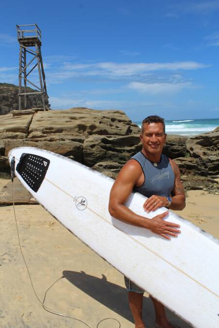 CONSISTENT WAVES: Longboarder Matt Rawson at his home beach.