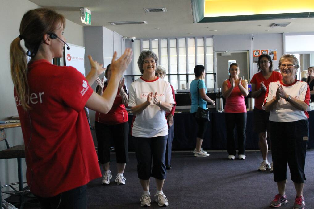2014 Belmont Healthy Lifestyle Expo at Belmont 16s. Heartmoves instructor Deborah Moore leads a fitness demonstration.