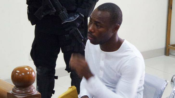 Michael Titus Igweh, who is facing execution in Indonesia within days, tells a court that police electrocuted his genitals to extract a confession.
 Photo: Andri Donnal Putera