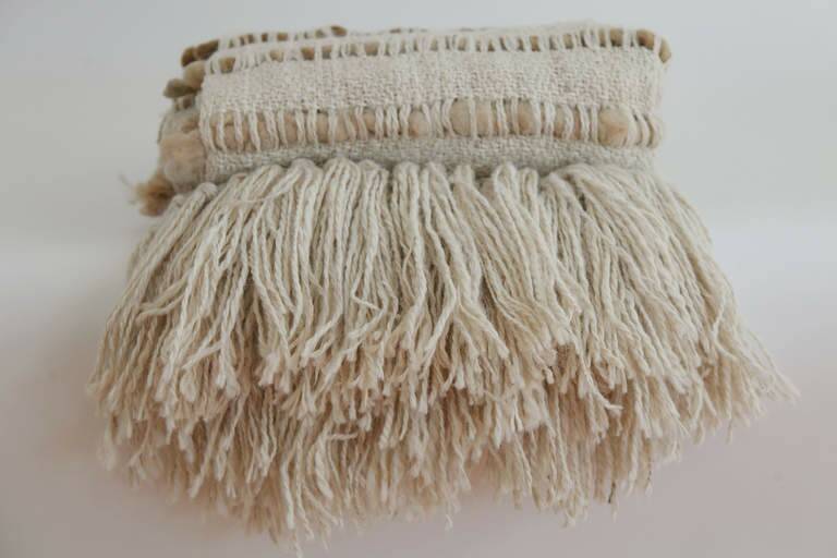 Argentinian wool knit multicordon throw, $655, 1.3m x 1.8m, 100 per cent wool mix (merino/llama), thedesignhunter.com.au. Photo: Supplied