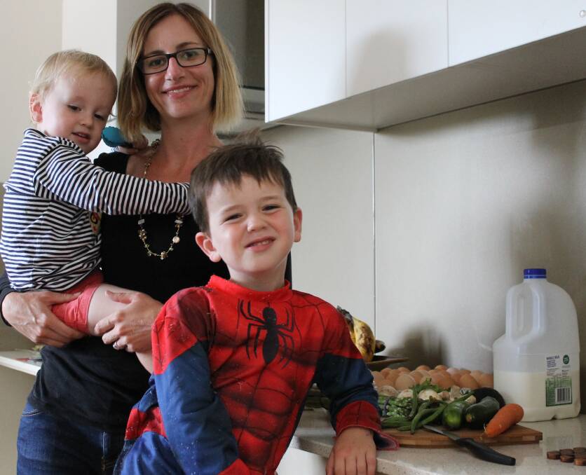PRACTISE WHAT YOU PREACH: Hunter Councils' regional waste education co-ordinator Juliana Caine in the kitchen with her sons Felix, 2, and Hugo, 4.