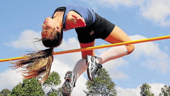 JUNIOR SPORT: Highjumper  Emma-Sue Greentree was a gold medallist at the International Children's Games at Lake Macquarie. Emma-Sue is pictured in training at Hunter Sports Centre Glendale, 2013. Picture: Peter Stoop