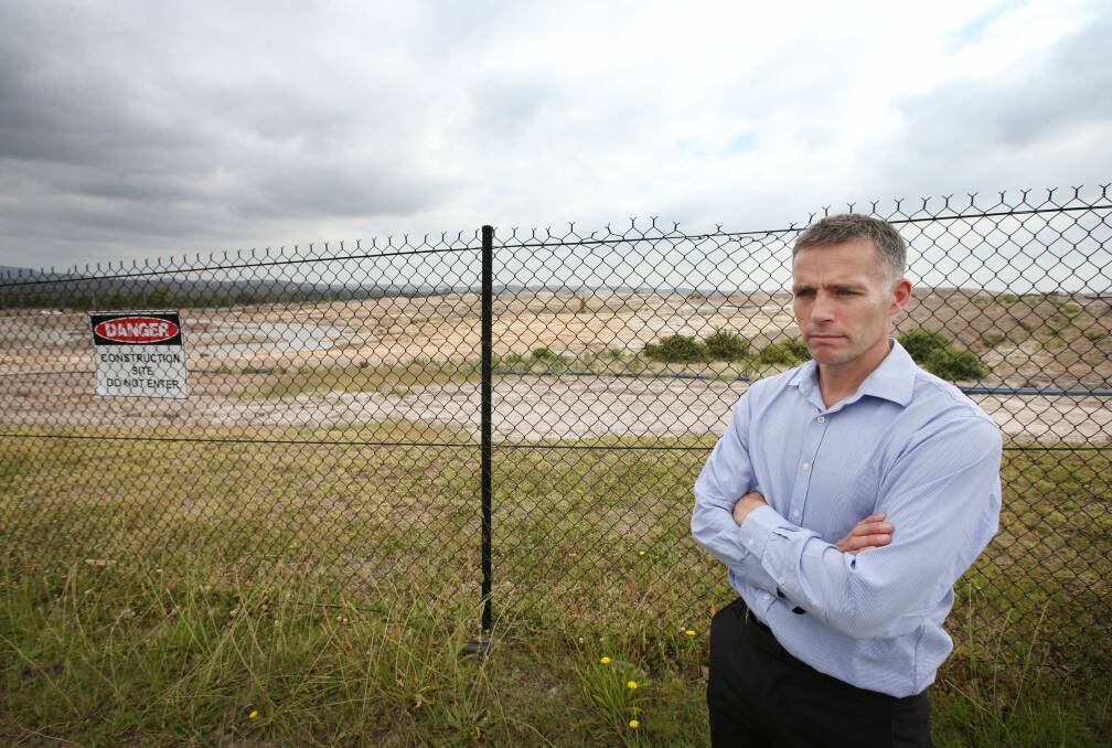 LEAD LAND: Macquarie University professor Mark Taylor at the former Pasminco Smelter site in Boolaroo.