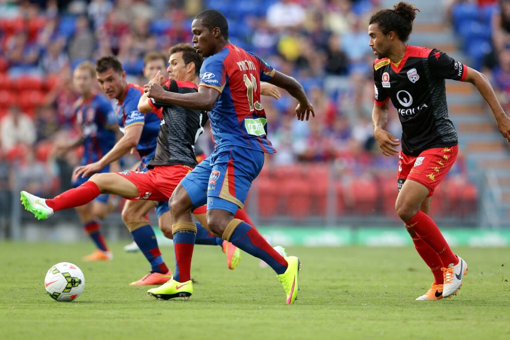 MISS: Newcastle Jets Edson Montano sets himself up to take a shot at Adelaide's goal.