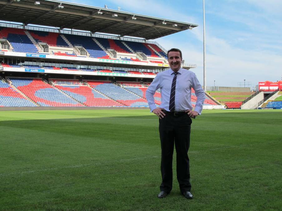AFC 2015 Asian Cup volunteer Ed Crawford at Hunter Stadium, where four of the cup's matches will be held.