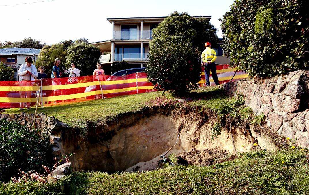 The second sinkhole that appeared in Swansea, two doors down from the first.