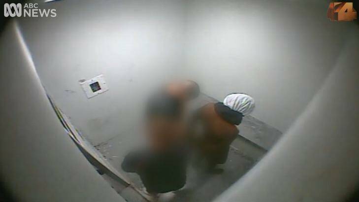 A boy handcuffed and hooded in an isolation cell of the Don Dale Youth Detention Centre near Darwin. Photo: ABC Four Corners