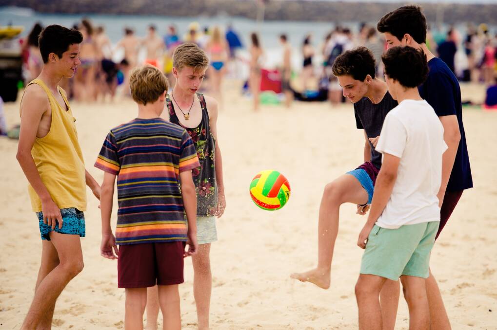 NST NEWS. 2014 Lake Macquarie International Children‚Äôs Games athletes take part in the beach experience at Blacksmiths Beach. Picture: Geoff Clark
