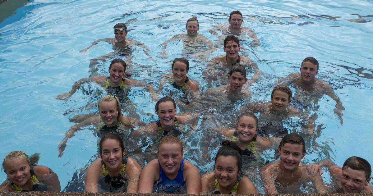 HARD WORK: Some of Team Lake Macquarie's water polo players at Speers Point Swim Centre.