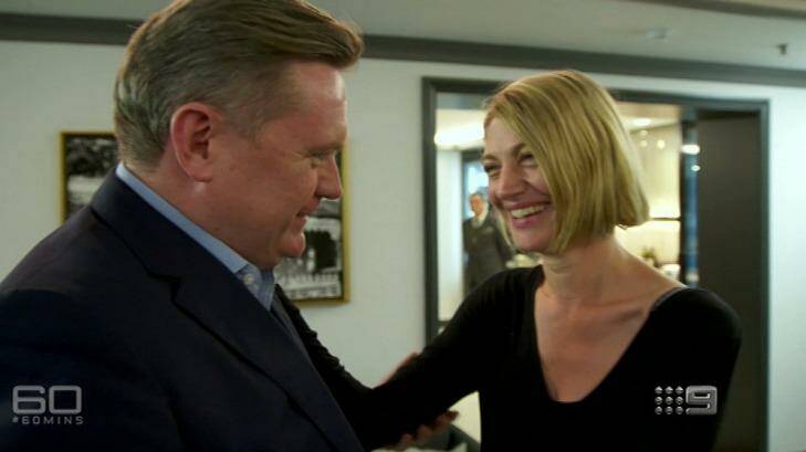 Michael Usher greets colleague Tara Brown at the beginning of a 60 Minutes interview. Photo: Channel Nine