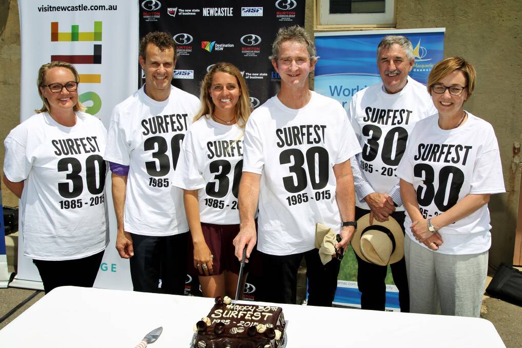 SWEET EVENT: Newcastle lord mayor Nuatali Nelmes, Newcastle state MP Tim Crakanthorp, surfer Philippa Anderson, Surfest patron Mark Richards, Port Stephens deputy mayor Steve Tucker, and Lake Macquarie mayor and Charlestown state MP Jodie Harrison cut the 30th anniversary cake. Picture: Throwing Buckets Magazine
