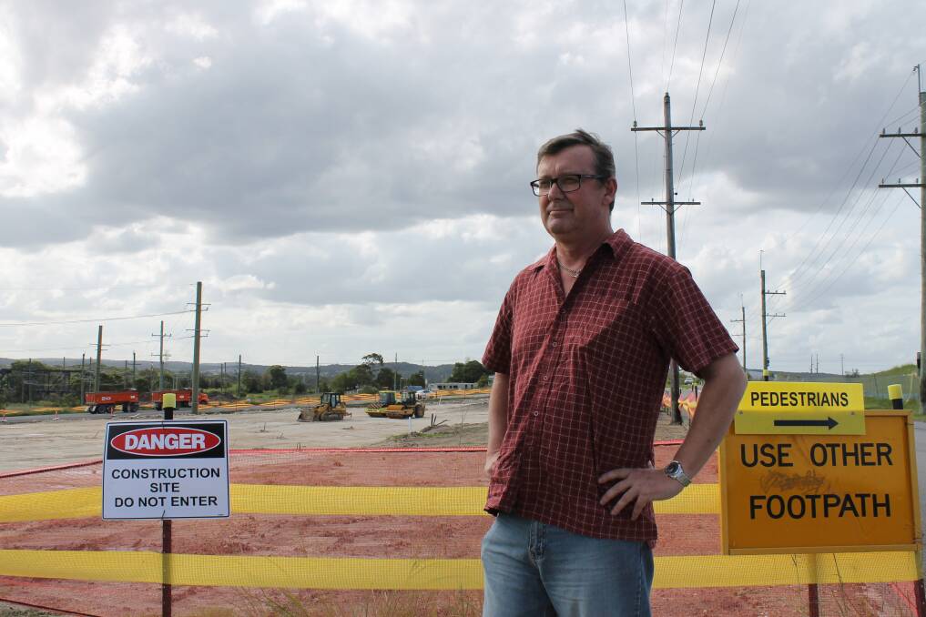NO ACCESS: Speers Point resident David Whittman examines the construction of a $9 million roundabout intersecting TC Frith Avenue and Main Road, Boolaroo.