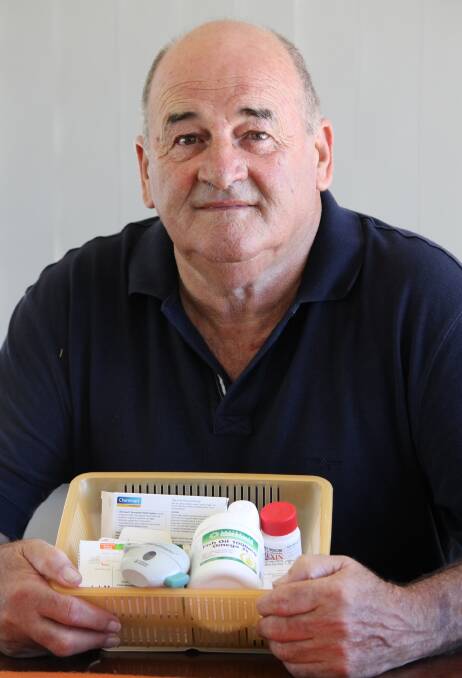 FEELING BETTER: Edgeworth resident Garry Phillips, who has Chronic Obstructive Pulmonary Disease, with some of his medication to treat the illness.