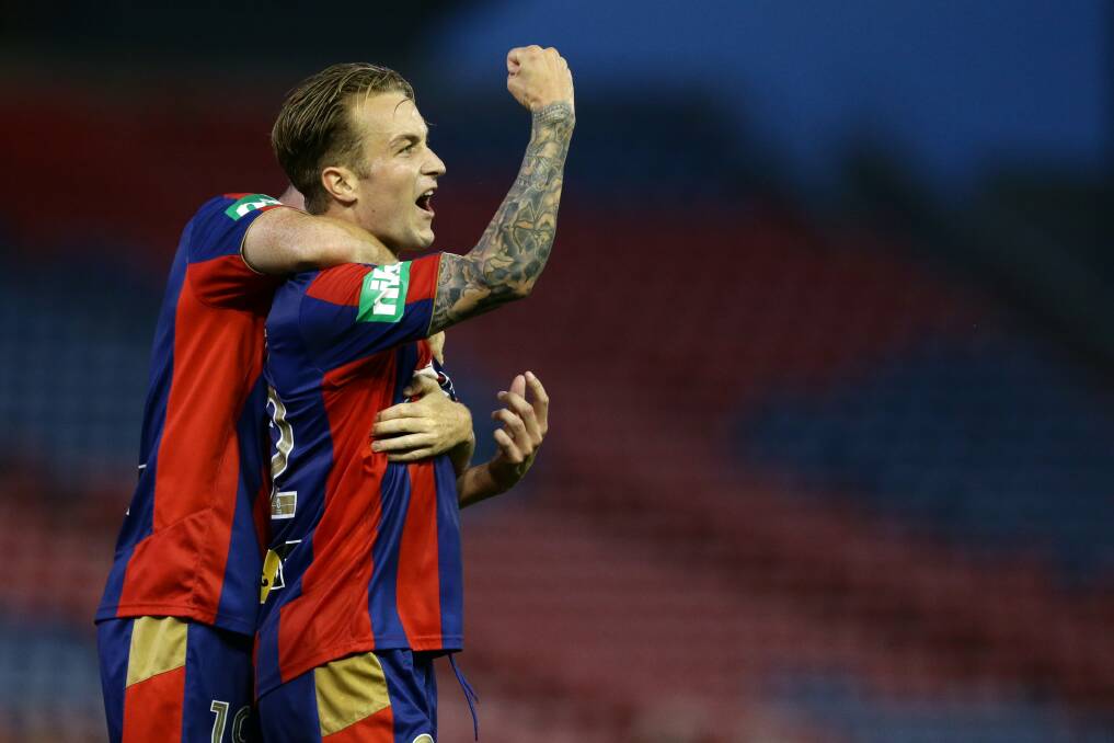 SWEET SUCCESS: Newcastle Jets player Adam Taggart.