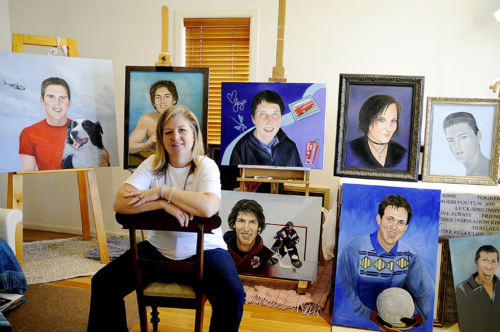 RAISING AWARENESS: Morpeth artist Kathie Bowtell with her portraits featured in stART Talking.