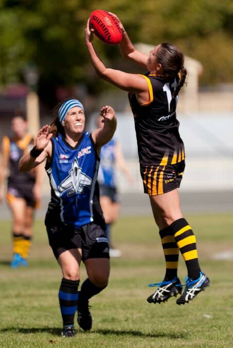 MOVES: Gungahlin take on Queanbeyan in AFL Canberra women's action.