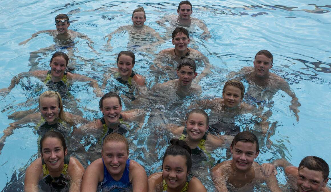 HARD WORK:  Some of Team Lake Macquarie’s water polo players at Speers Point Swim Centre.