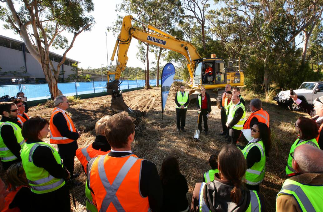 Officials gather at the sod-turning ceremony to mark the start of the Glendale Transport Interchange's construction.