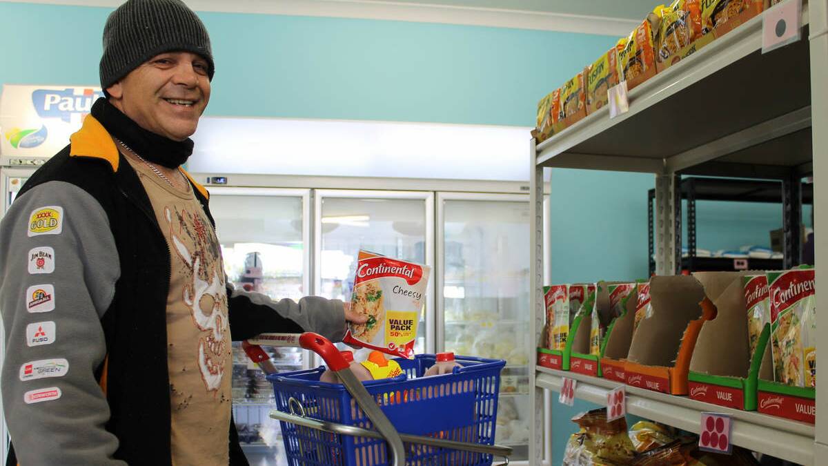 SHOPPING DAY: Gateshead’s Peter Mitzzi shops at the BaptistCare Windale Community Centre supermarket.