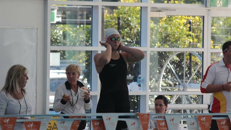 Gabrielle Grieves prepares to take to the pool.