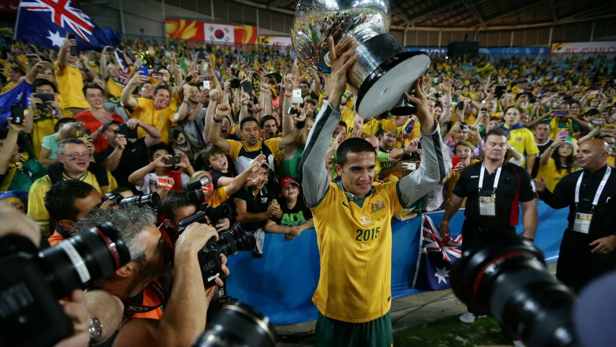 Tim Cahill with the coveted Cup. Picture: Jonathan Carroll