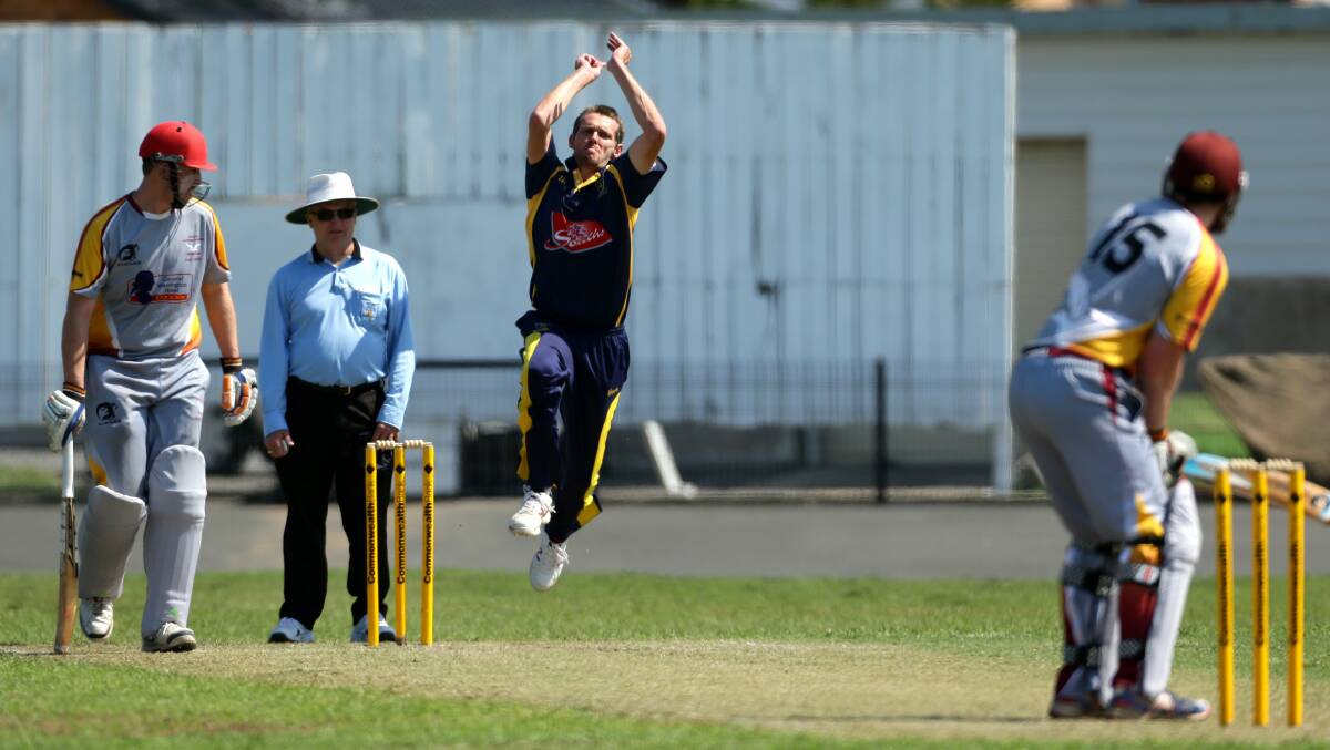 Merewether bowler Michael Hogan in action against Stockton on Saturday.