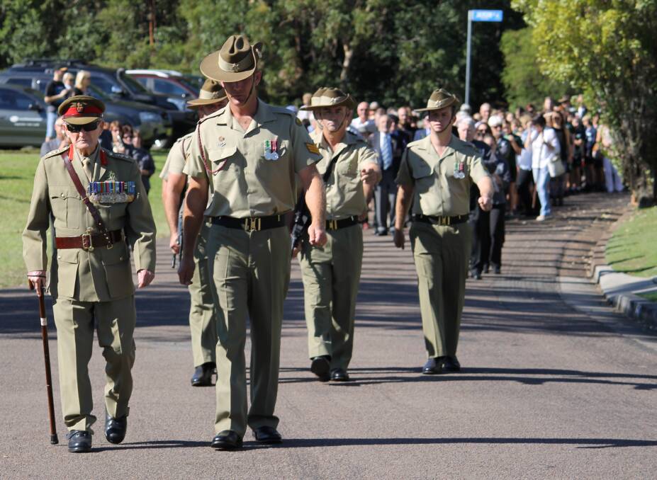 Valentine Lion's Club Anzac Centenary service with its first street march from Allambee Place to Allambee Park.