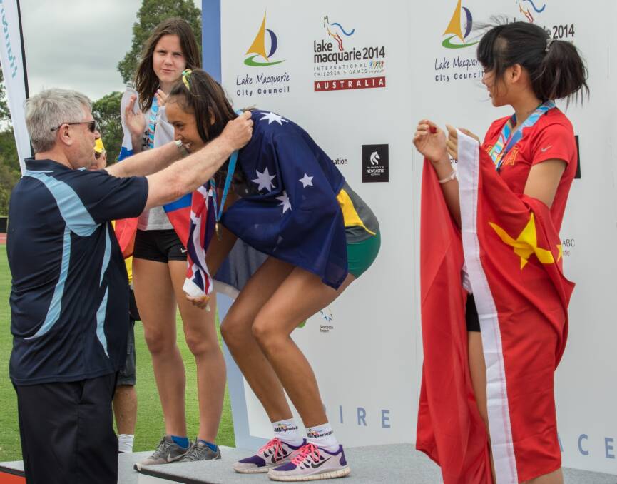 Team Lake Macquarie's Dakota Thomas wins gold in the girls' 100-metre sprint. Picture: Vin Imagery