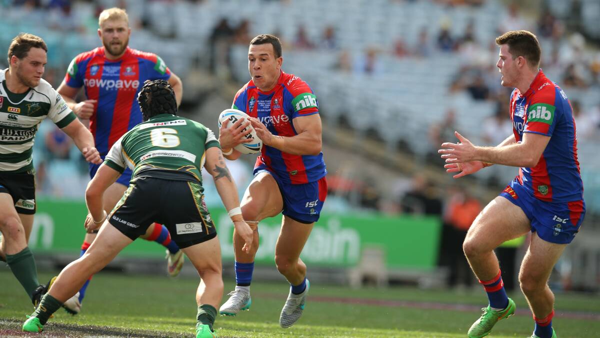 ANZ Stadium, Homebush, Sunday October, 4. Newcastle Knights, in blue and red, and  Ipswich Jets, in green and white.