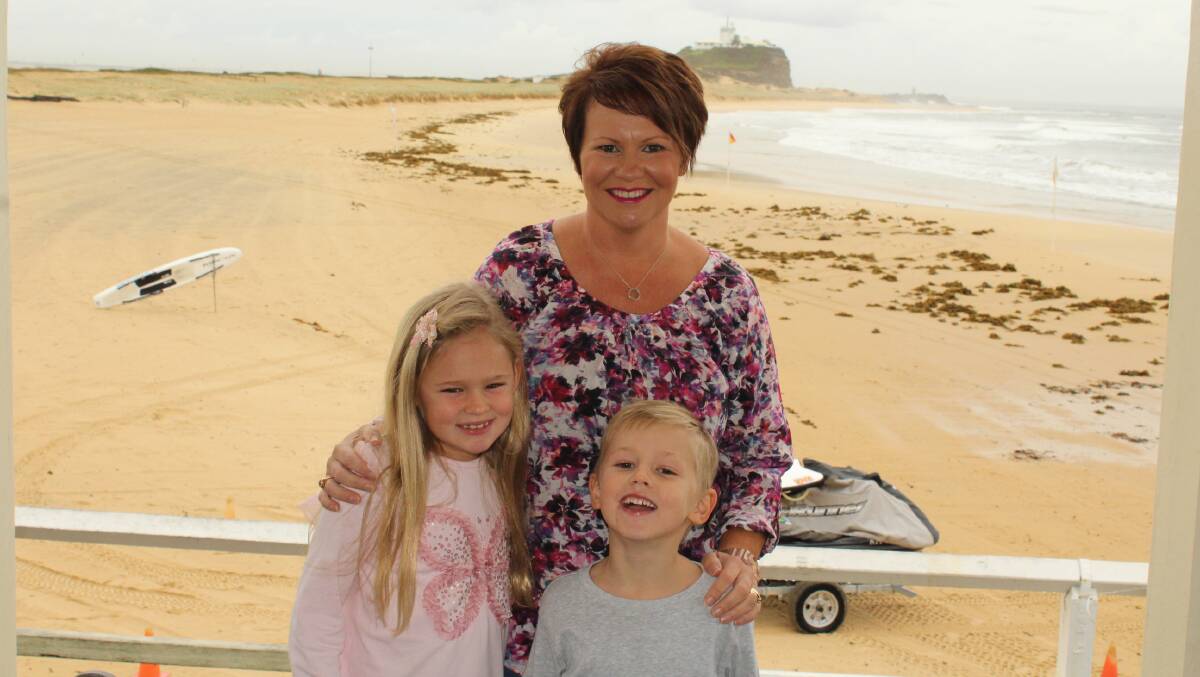 Zoe Russell,7, of Macquarie Hills with her mum Michelle and brother Zac, 5.