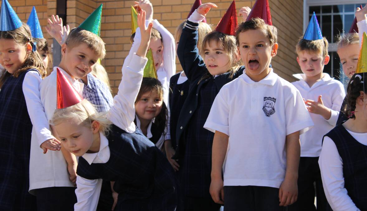 Hamilton South Public School kindergarten students perform "Happy" at their Friends Day/Art Show
