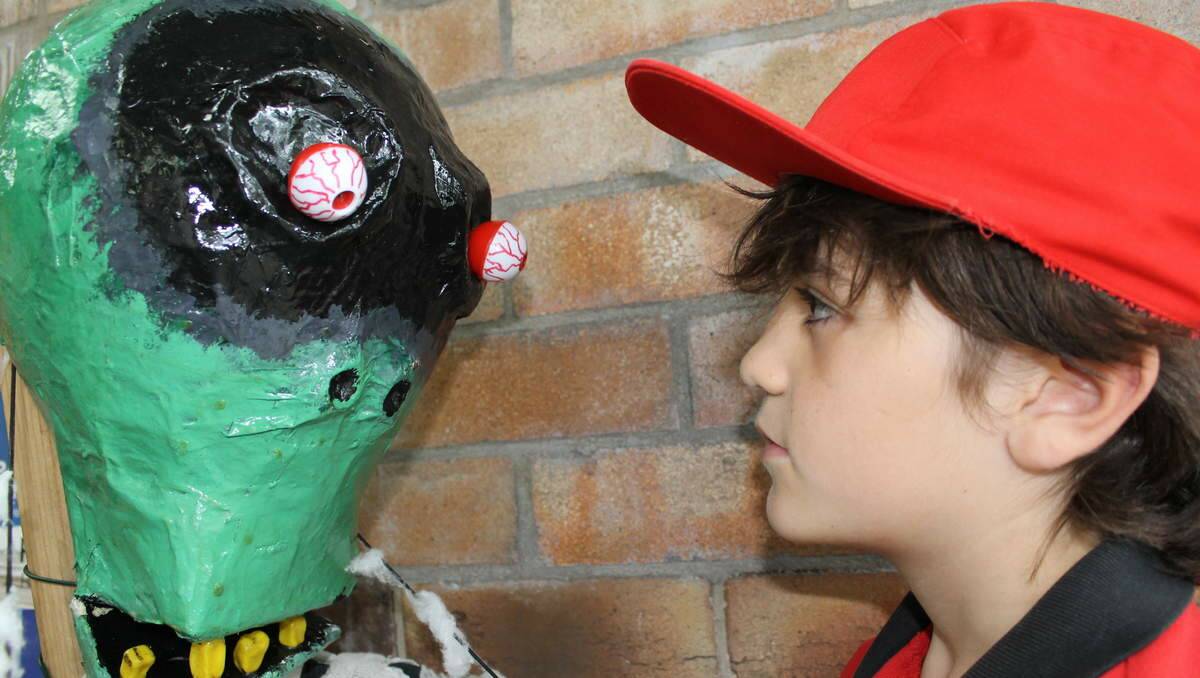 SCARECROW: Dominic McMillan, 8, from Mayfield East, with "Zombie Scare Mummy".