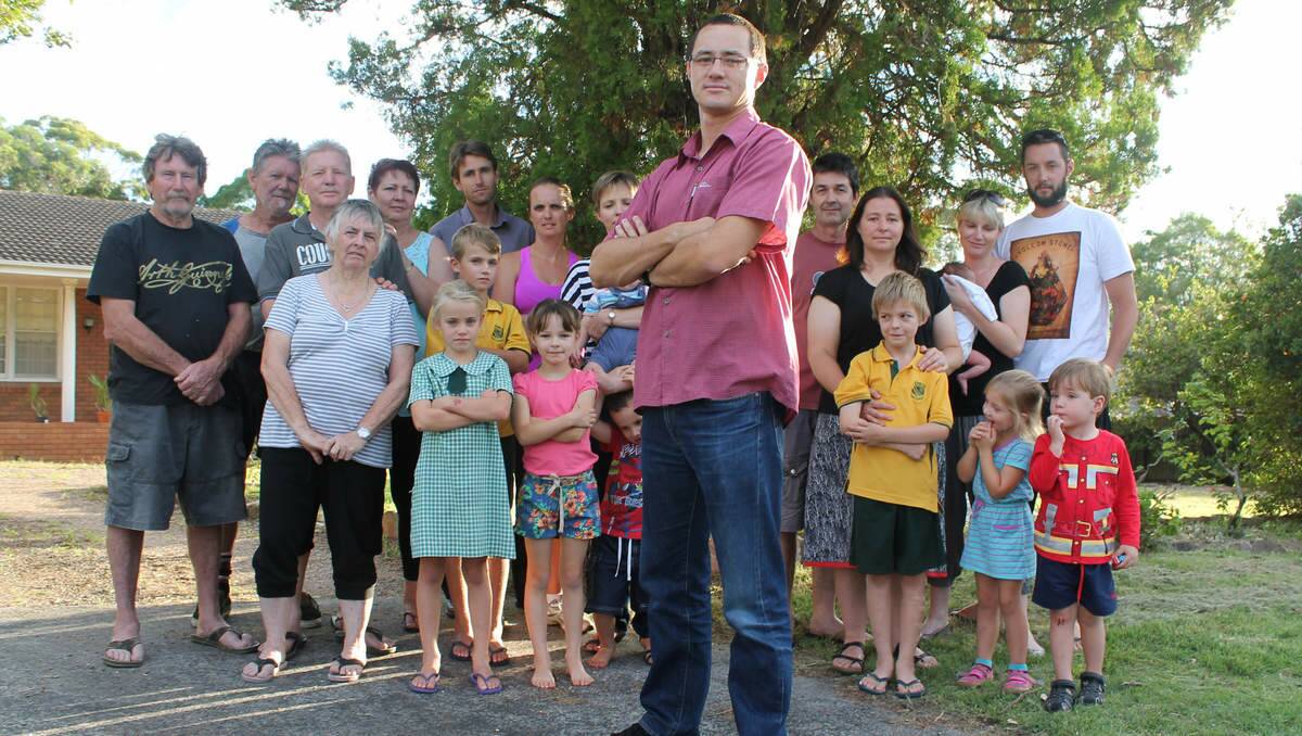 UNITED STAND: Garden Suburb resident Gary Mulhearn stands on the proposed site for the childcare centre with other residents who are against the development for a multitude of reasons, including increased traffic.