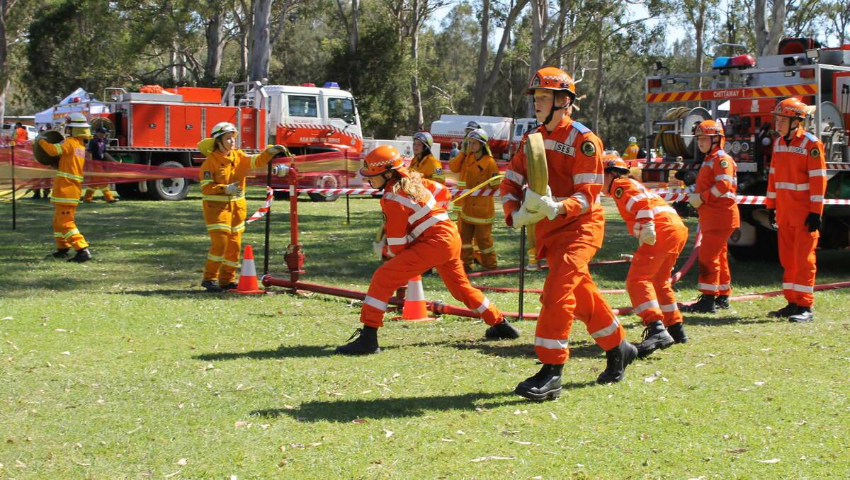 FIRING: SES cadets Jacinta Pinkerton, Tom Ellis, Hannah Murphy, Ida Topic and Shaun Farmer take on a NSW Rural Fire Services team in the hose and hydrant drill.