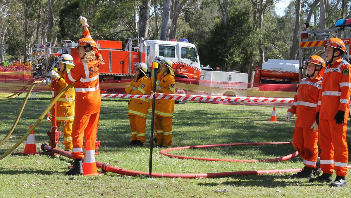 SES team competing in the hose and hydrant drill at the 2013 Australian Fire Cadets Championships, Myuna Bay.