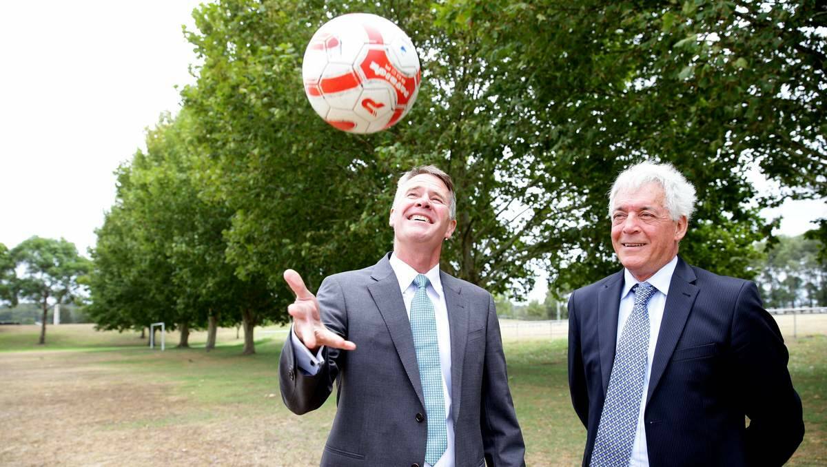 FIELD OF DREAMS: Deputy Premier and Minister for Regional Infrastructure and Services Andrew Stoner with Northern NSW Football chairman Bill Walker.