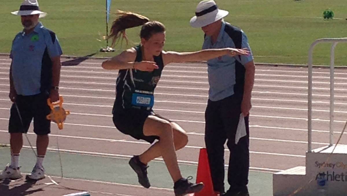 ONE TO WATCH: Erin Cleaver competing in long jump at the All Schools Athletics Championships last year.