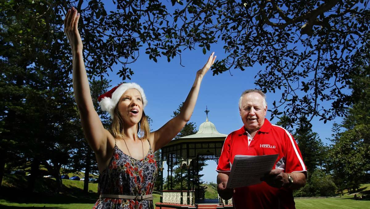 Novocastrian singer songwriter Lauren Wheatley who is singing at the carols, and carols musical director Milton Ward at the rotunda in King Edward Park