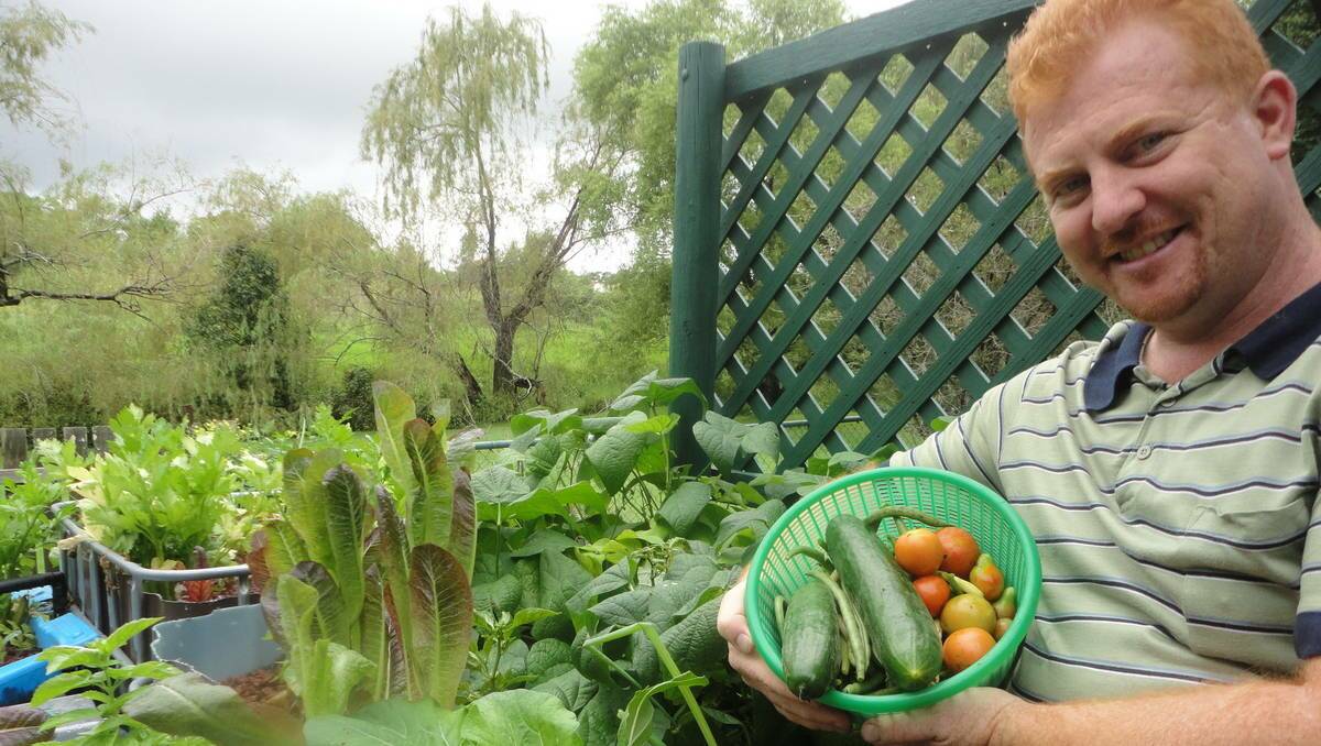 GREENER LIVING: Ecologist Rodney Ingersoll with his aquaponics sustainable garden system.