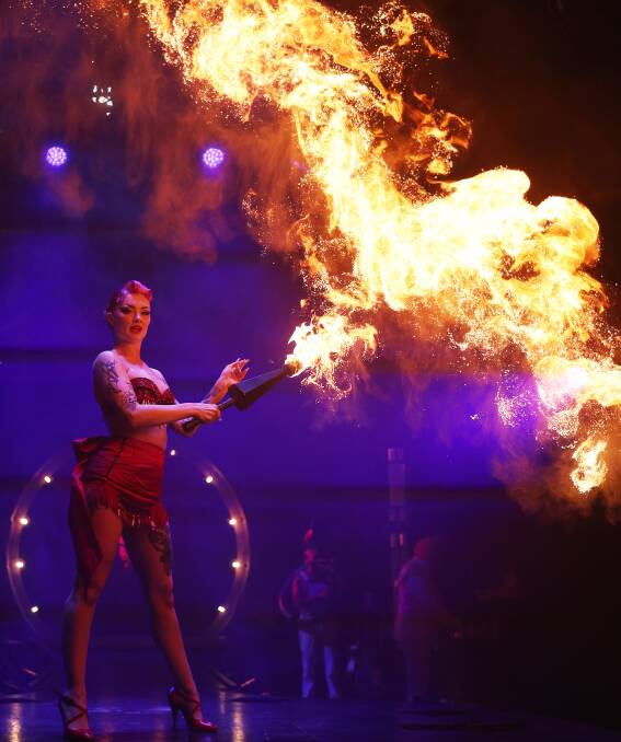 Fire breathing acrobat Clara Fable performing a routine from Limbo The Return at a media call in Newcastle on Tuesday. Picture by Peter Lorimer