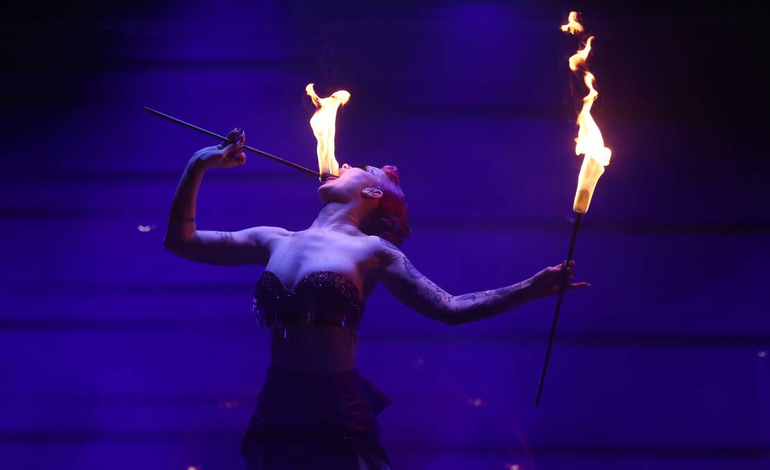Clara Fable's fire breathing act is lightning quick and feels dangerous. Picture by Peter Lorimer
