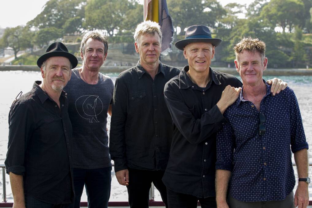 Midnight Oil at Friday morning's press conference in Sydney.