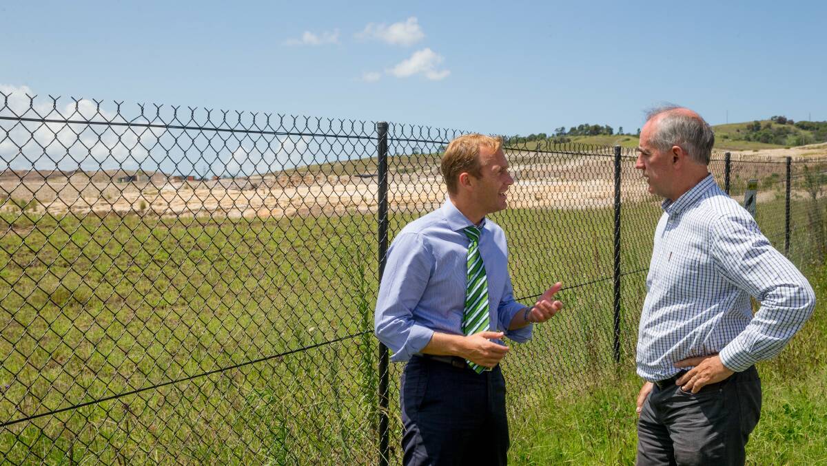 Lead Legacy: Lake Macquarie MP Greg Piper (right) with former environment minister Rob Stokes at the old Pasminco site in Boolaroo. Picture: Ryan Osland.
