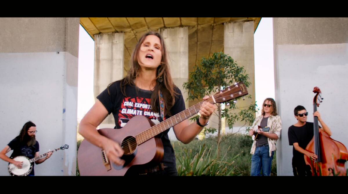 Protest Song: Steel City Sue in her music video for the song Boom Town. 