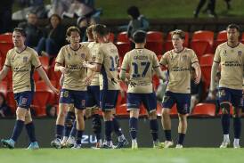 The Jets celebrate after grabbing a 1-0 lead against Wellington. Picture Getty Images